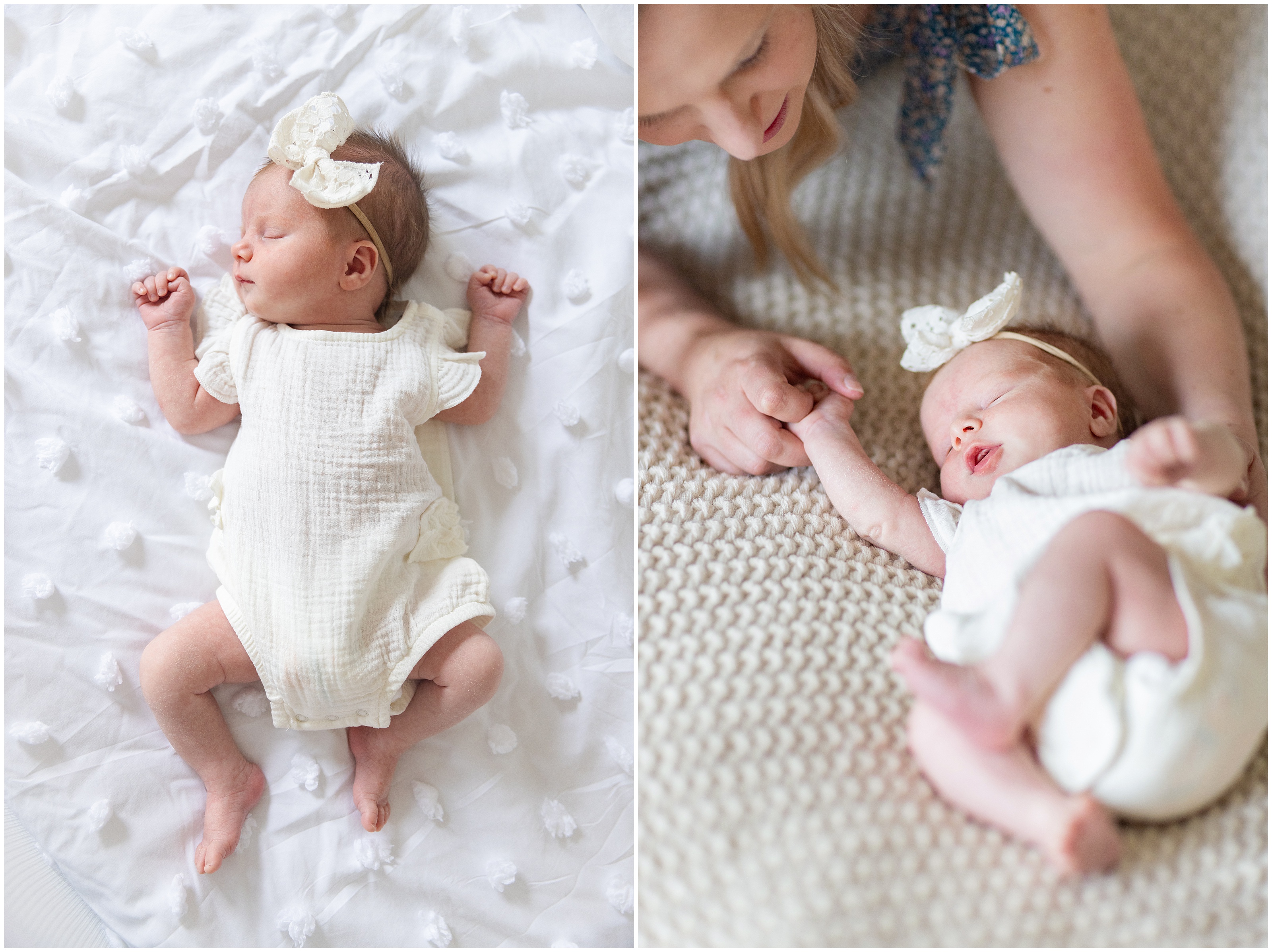 Sleeping newborn baby girl in white onesie and large hair bow on a white bed, with her mother gently holding her hand on a knit blanket